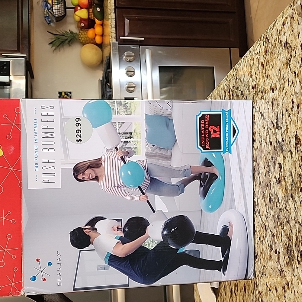 Two player inflatable push bumpers game